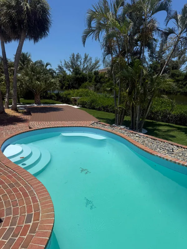 The same pool and lanai after the remodel